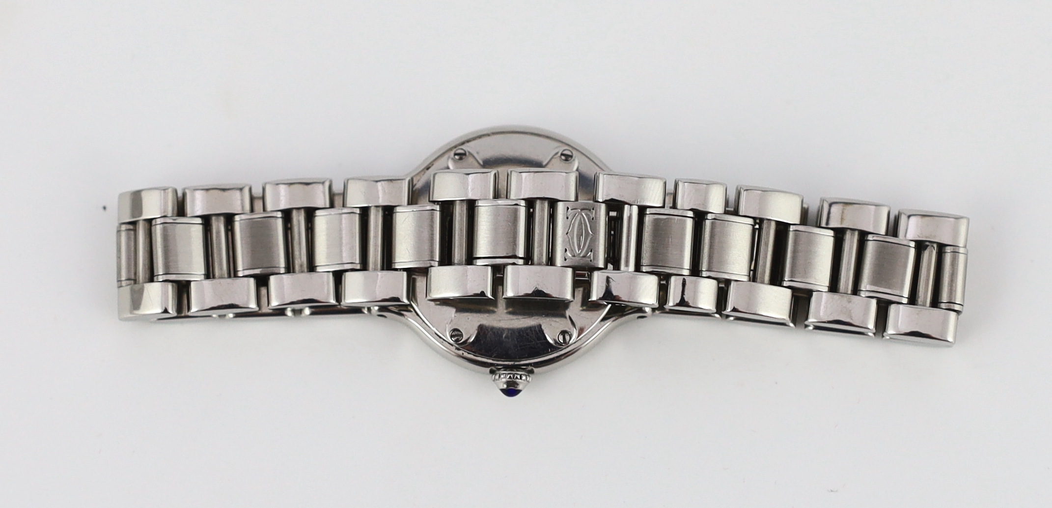 A lady's modern stainless steel Must de Cartier 21 quartz wrist watch, on a stainless steel Cartier bracelet